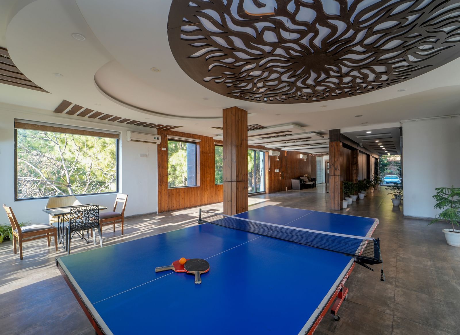 The game area of DLS Whispering Winds featuring a table tennis table